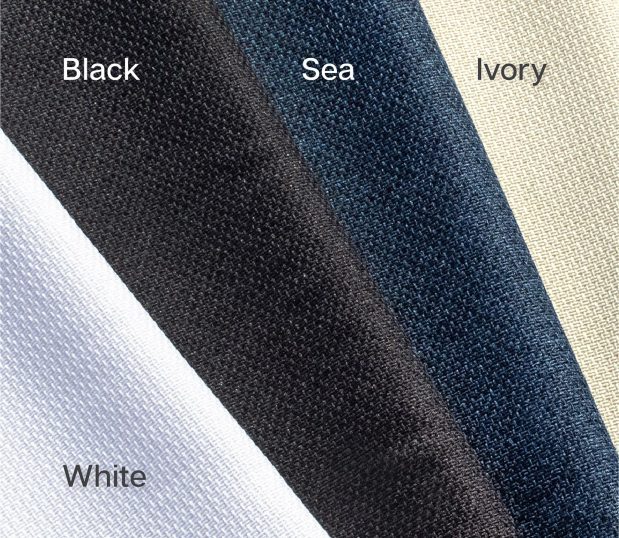 This shows the swatches white, black, sea and ivory for the Circa庐 Bed Wrap. It is a very textural fabric.